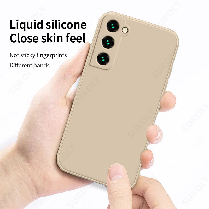 A beige-colored liquid silicone phone case for Samsung Galaxy, displayed in a half-wrapped design around the phone's camera module.
