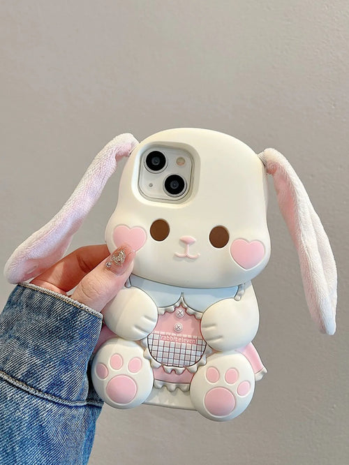 Cute bunny phone case held by a person with a plain background
