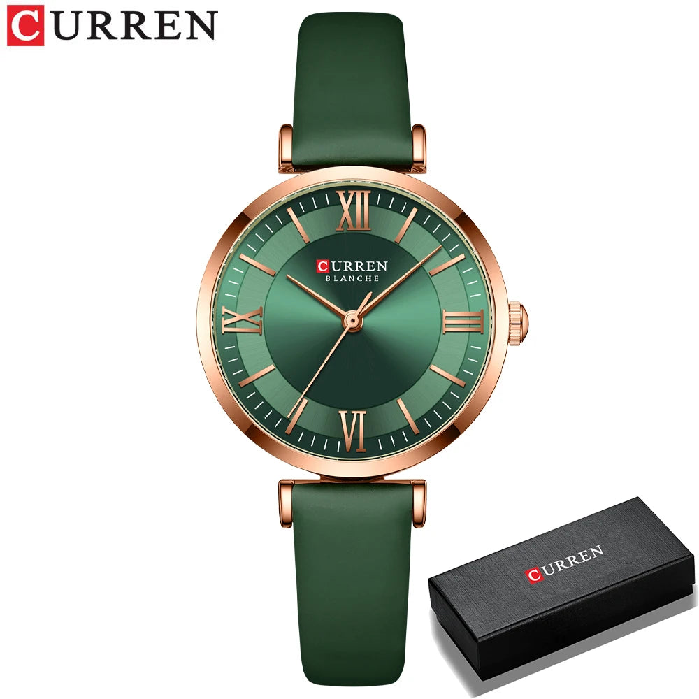 A CURREN brand wristwatch with a green leather band and rose gold case, featuring a green dial with Roman numerals.
