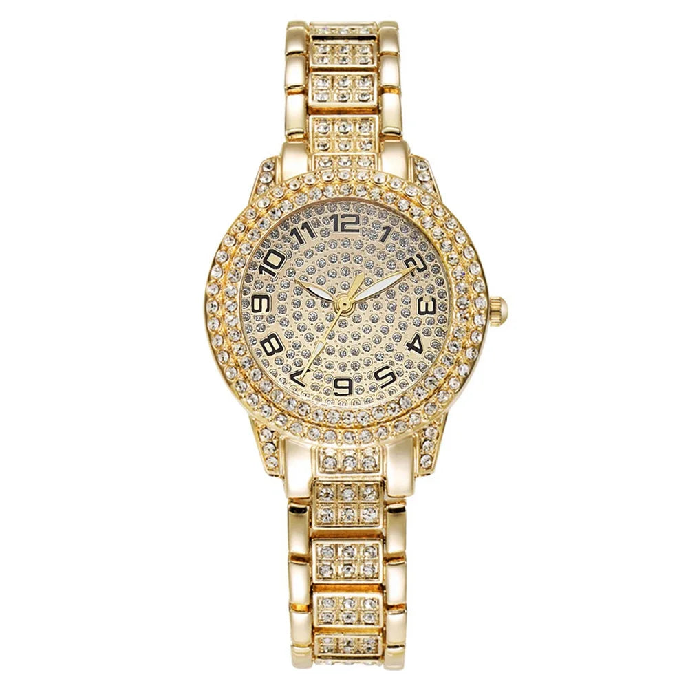 A watch, bracelet, necklace, and earrings, all adorned with faux diamonds.
