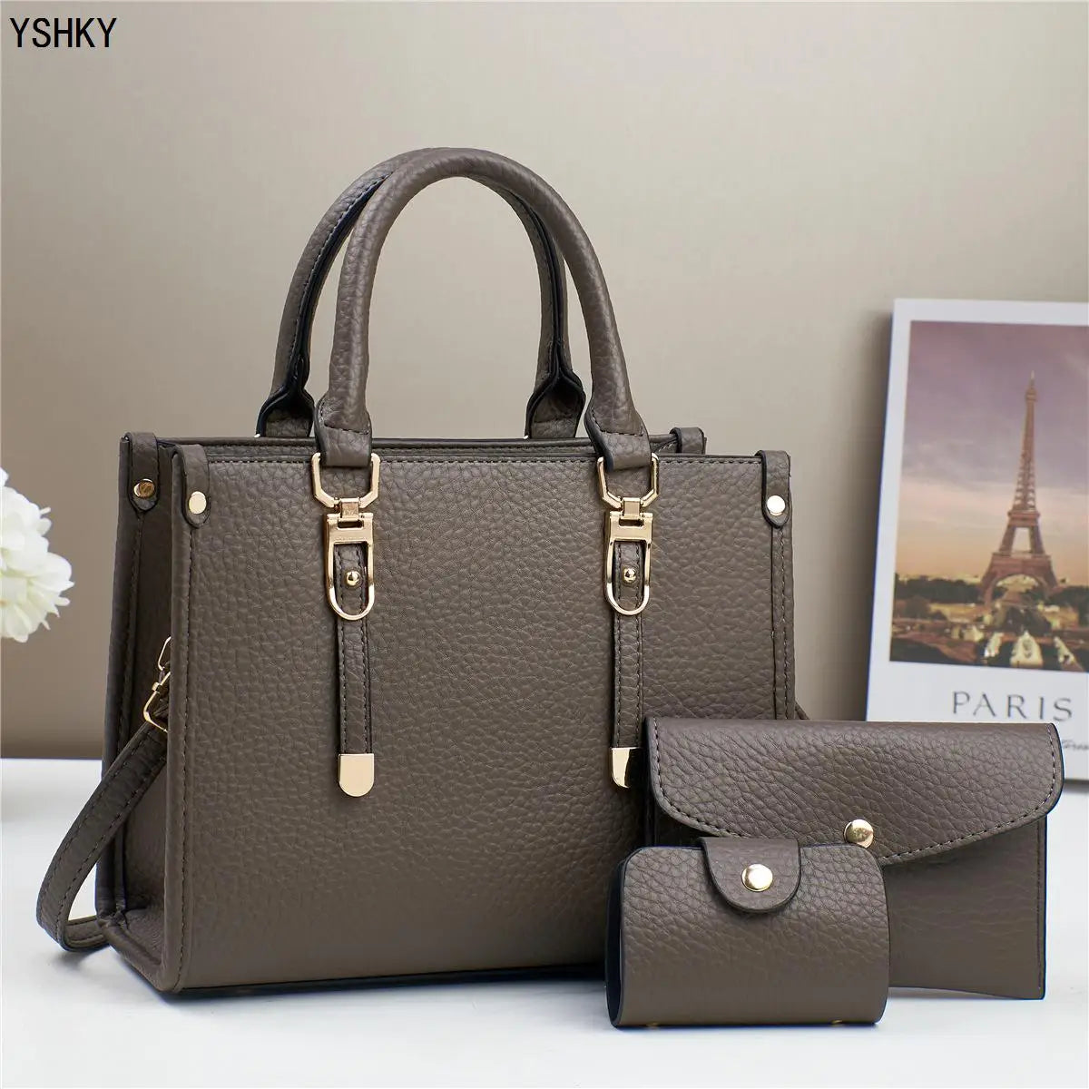 Shoulder hand bag with leather coating