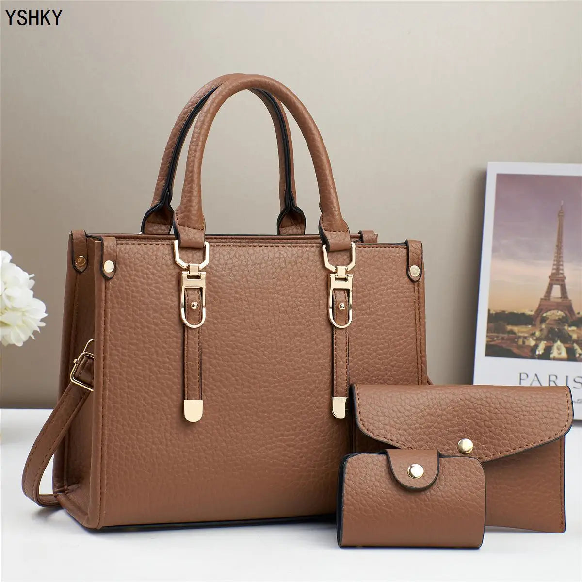 Shoulder hand bag with leather coating